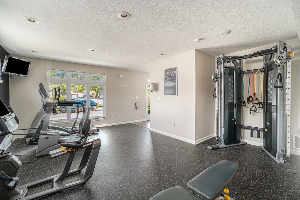 A luxurious shared amenity gym at Corinth Communities in Prairie Village Kansas.